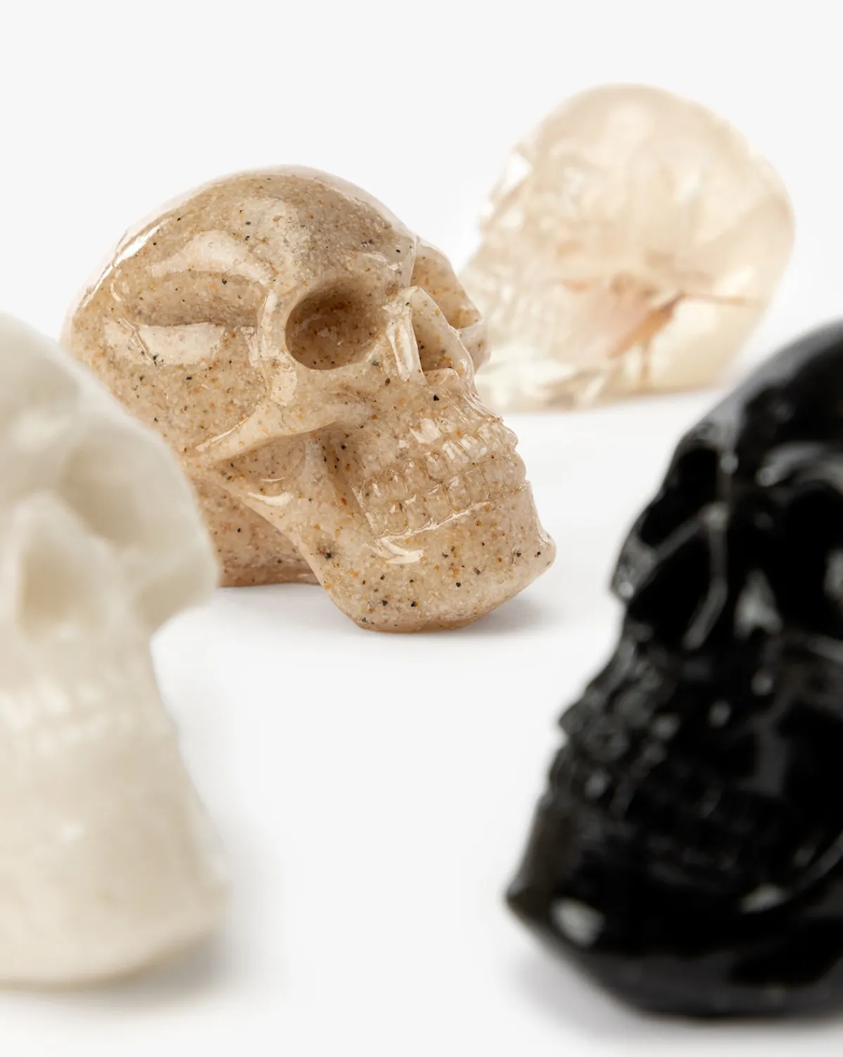 Assorted Resin Skulls (Boxed Set of 4)|Creative Co-op